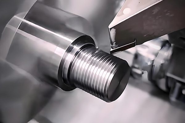 Cylindrical bushing showcasing CNC turned vs milled parts design indicators